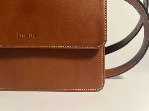 The Beacon Crossbody Saddle Brown