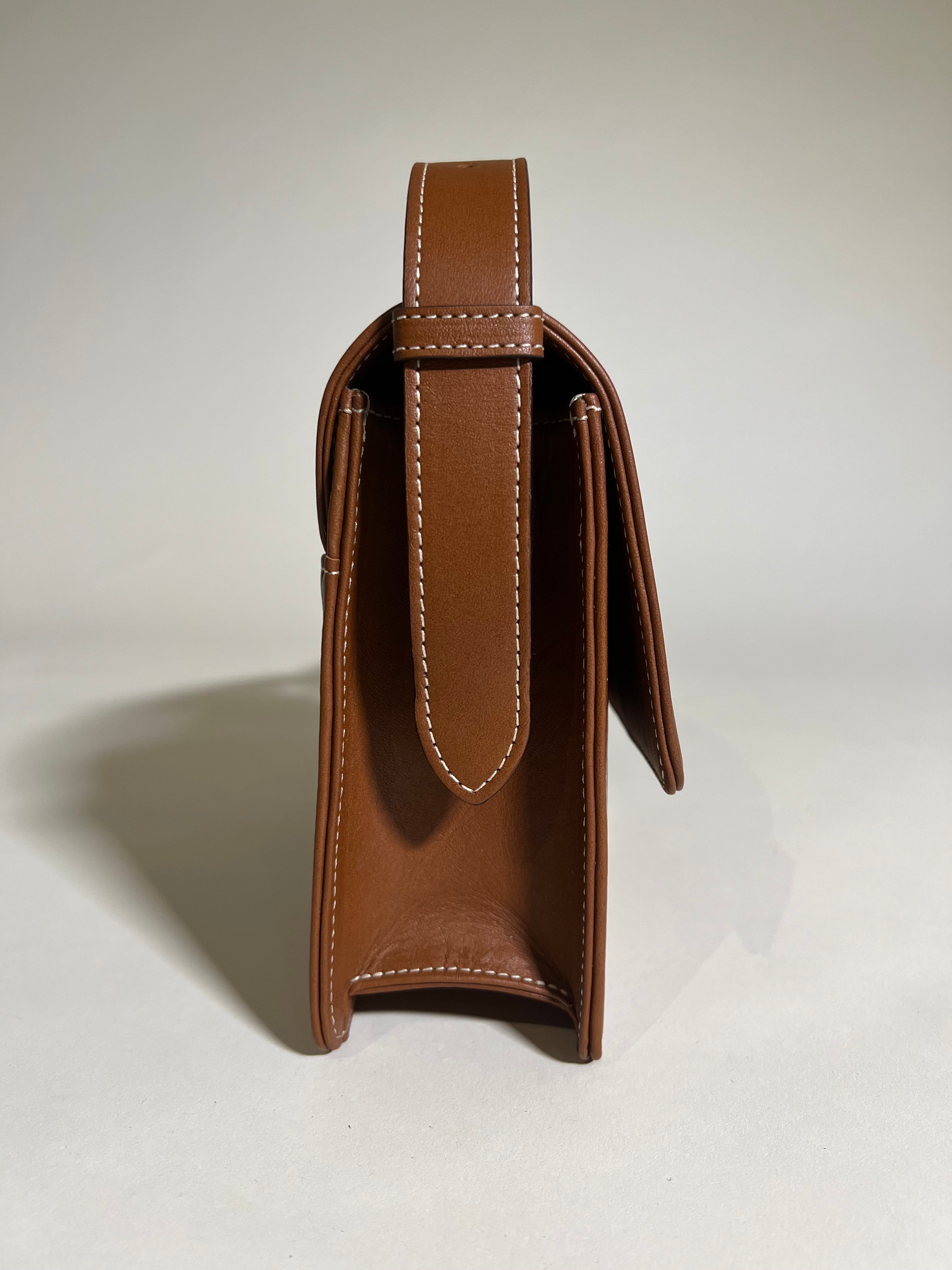 The Beacon Crossbody Saddle Brown